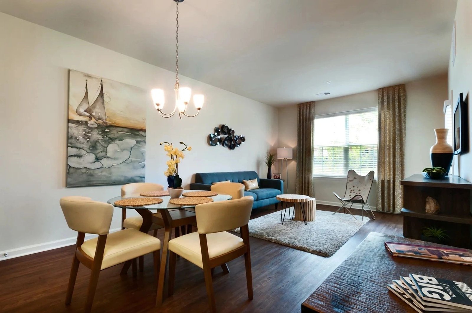 A warmly staged model apartment interior