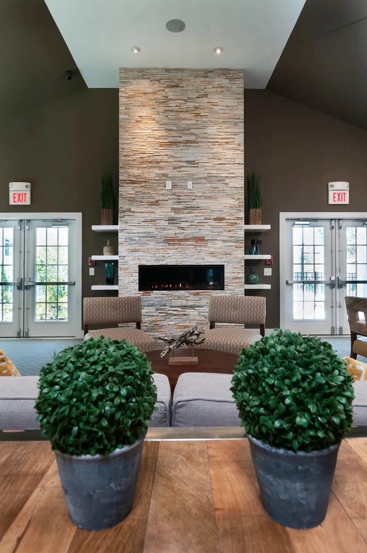 Morgan Bluff clubhouse lounge with a stone fireplace